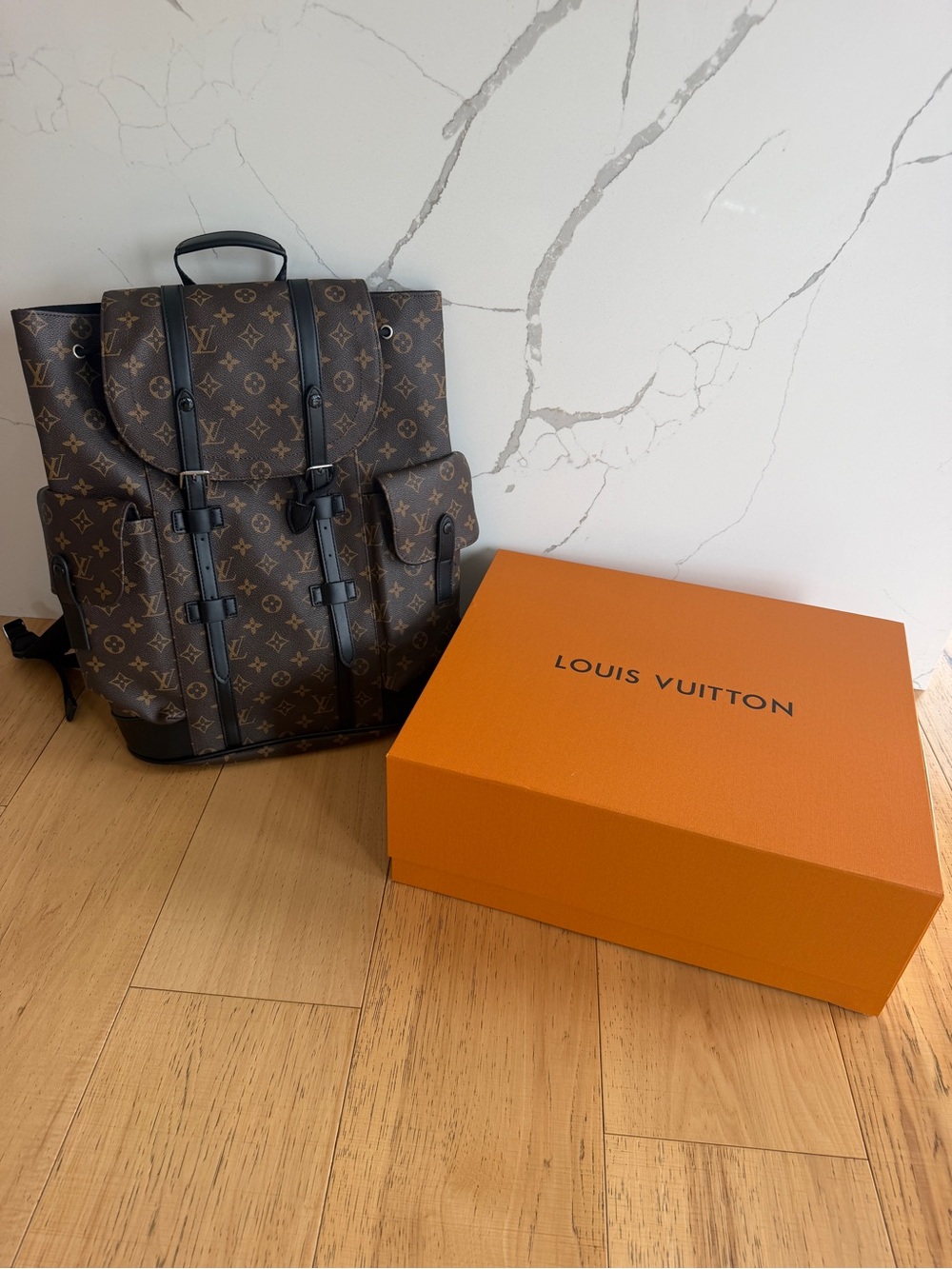 Louis Vuitton Monogram Canvas Backpack in Brown and Black